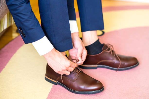 istock The man wears shoes 831269550