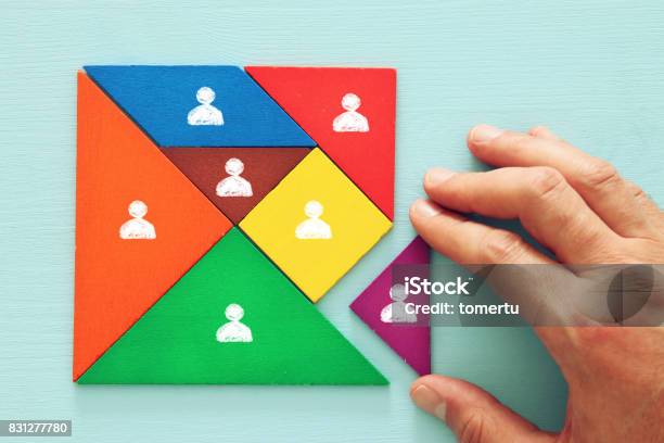 Tangram Puzzle Blocks With People Icons Human Resources And Management Concept Stock Photo - Download Image Now