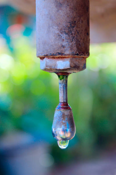 istock drop of water dripping from the washbasin 831292548
