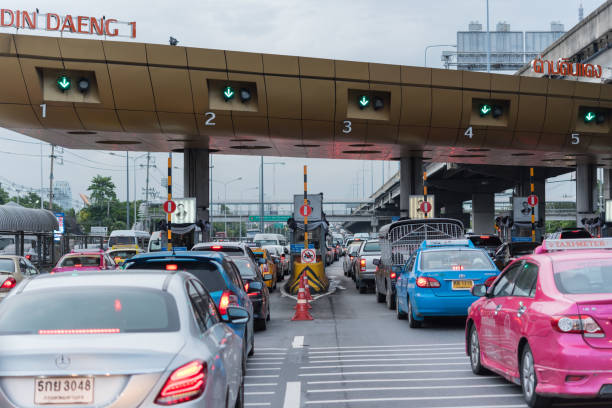 gate for expressway fee payment in bangkok - street furniture traffic lighting equipment urban scene imagens e fotografias de stock