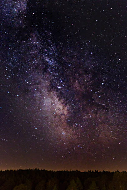 istock The Milky Way makes its way across the night sky 831303016