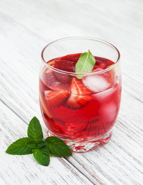 istock Glass of lemonade with strawberries 831306514