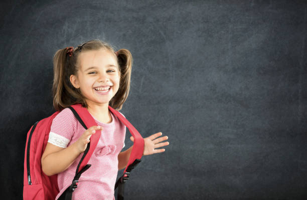 istock Back To School Concept, Happy Smiling Schoolgirl Studying 831306740