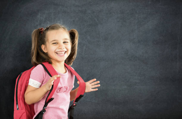 Back To School Concept, Happy Smiling Schoolgirl Studying Back To School Concept, Happy Smiling Schoolgirl Studying human back photos stock pictures, royalty-free photos & images