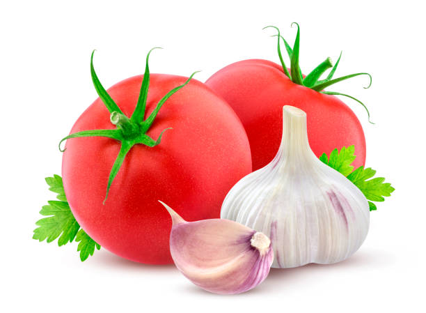 istock Tomato and garlic isolated on white background 831307102