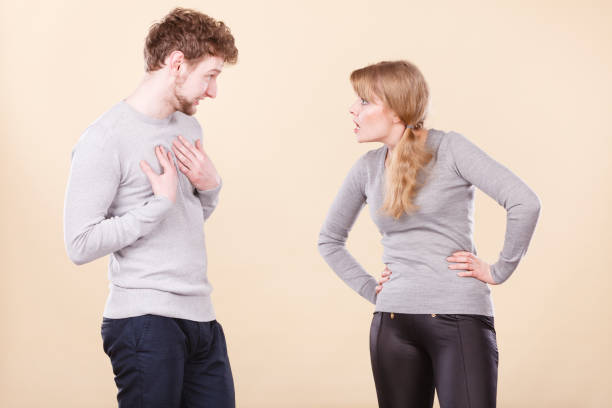 istock Young emotional couple arguing. 831309984