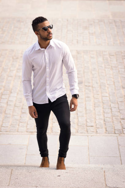 istock Black male portrait up stairs 831315686