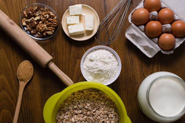 istock Baking ingredients on wooden background. 831326794