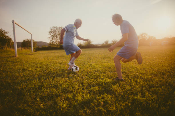 istock Senior soccer players in action 831329850