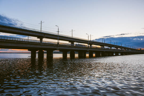 istock Bridge over water reservoir at sunset time 831334848