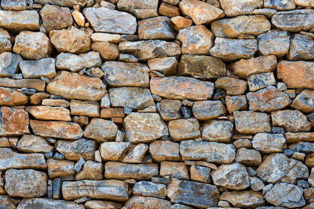 istock Background of an old stone brick wall 831337628
