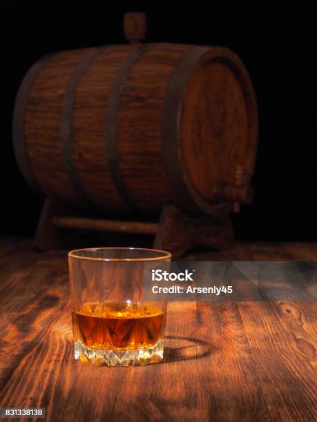 Glass Of Whiskey And Vintage Wooden Barrel Stock Photo - Download Image Now - Barrel, Whiskey, Bourbon Whiskey