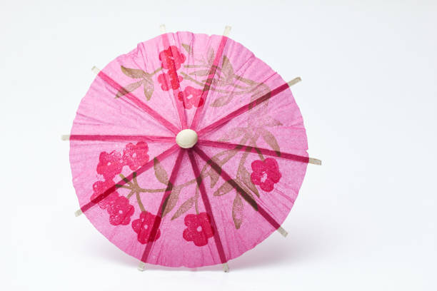 istock Cocktail umbrella on a white background. 831341788