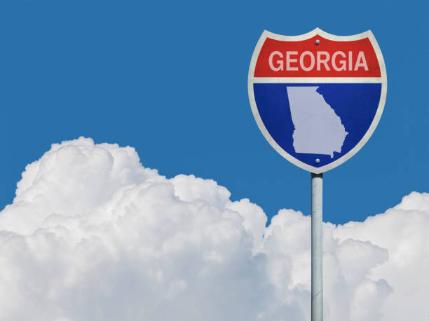 Highway sign for Interstate road in Georgia with map in front of clouds Highway sign for Interstate road in Georgia with map in front of clouds georgia us state photos stock pictures, royalty-free photos & images