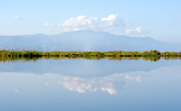 istock Reflections in Loktak Lake waterscape, Manipur, India. 831348096