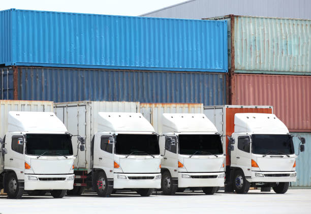 istock Trucks lorries loading unloading depot warehouse,Truck  transportation  Freight cargo transport  Shipping 831353784