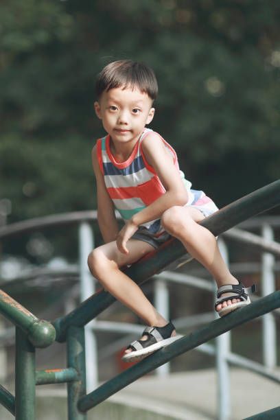 istock Cute children playing in the park 831356972