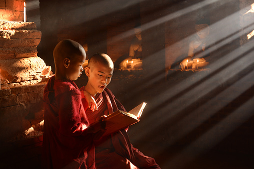 The little monks who read the holy book in Bagan, Myanmar.
