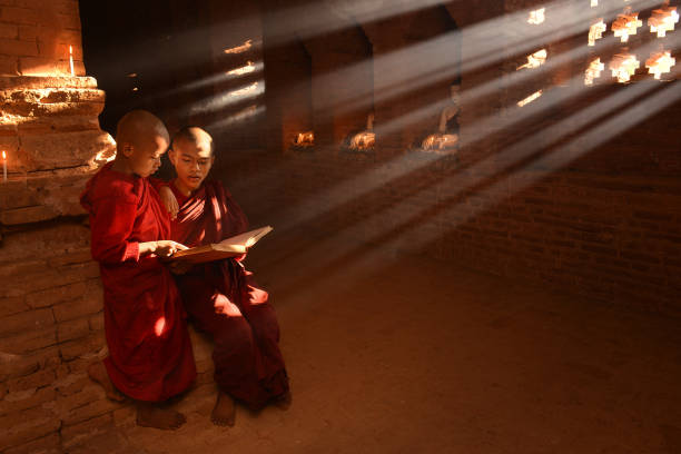 istock Young buddhist monks in Myanmar 831360172
