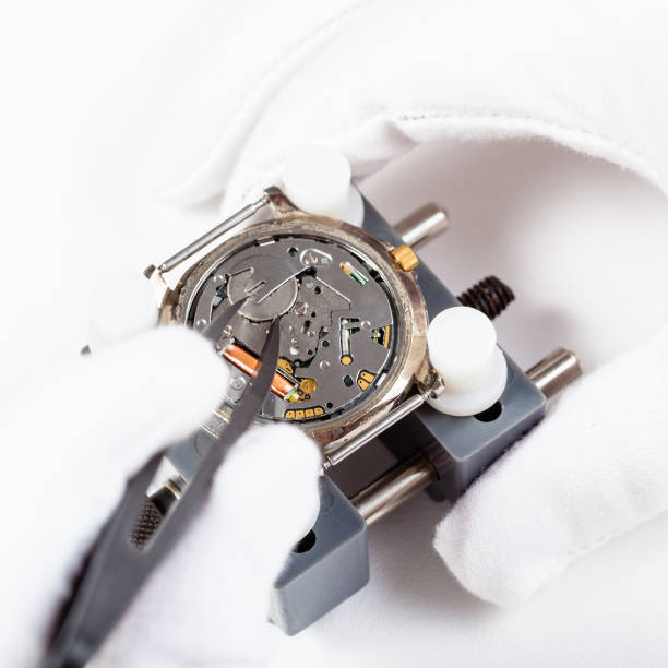 istock replacing battery in quartz wristwatch close up 831360460