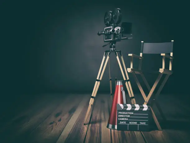 Video, movie, cinema concept. Retro camera, clapperboard and director chair. 3d illustration