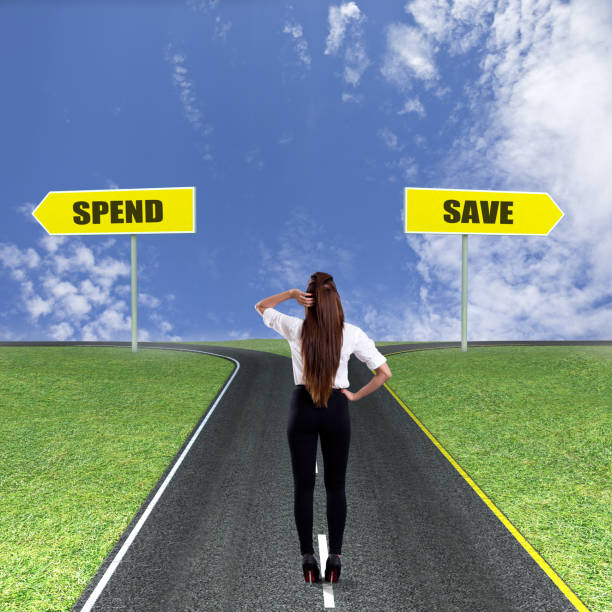 istock Businesswoman thinking to save or to spend 831367354