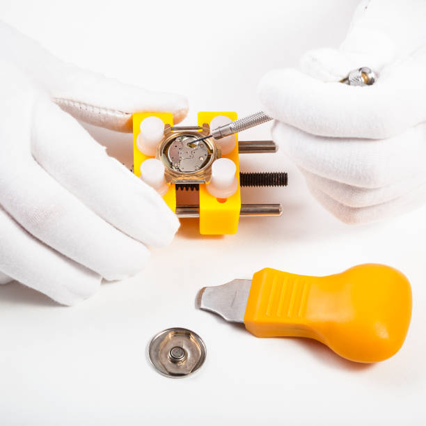 istock cleaning battery place in quartz watch 831367558