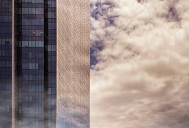 istock Adjusted image of high building in mist with orange tone 831368868