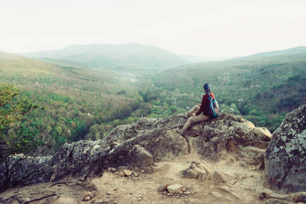 istock Hiker enjoying of mountain view. 831381706