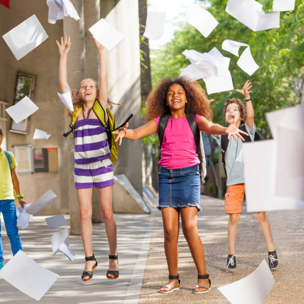 istock Group of school kids have fun after class 831382102