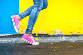 Woman in pink sneakers