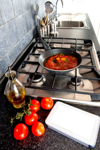 istock Preparing Tuscany Tomatoes sauce 831383846