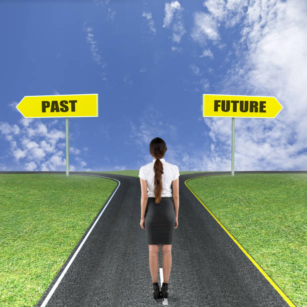 istock Businesswoman thinking about past or future 831387292