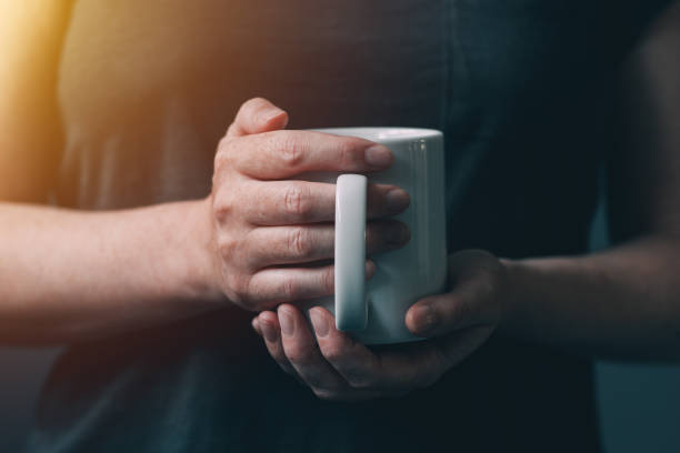 istock Woman drinking morning coffee 831390686
