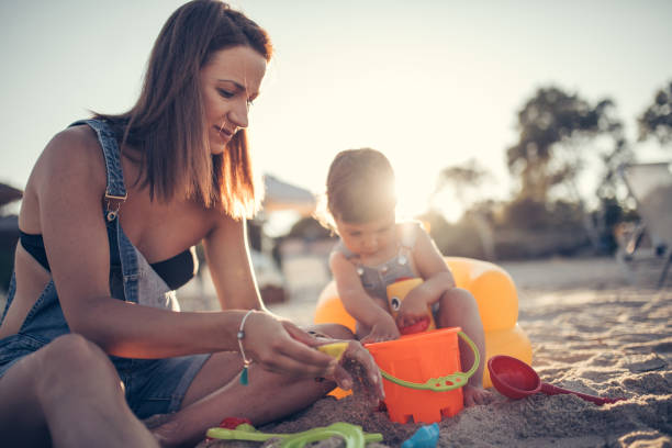 istock Young baby and her mother 831390888