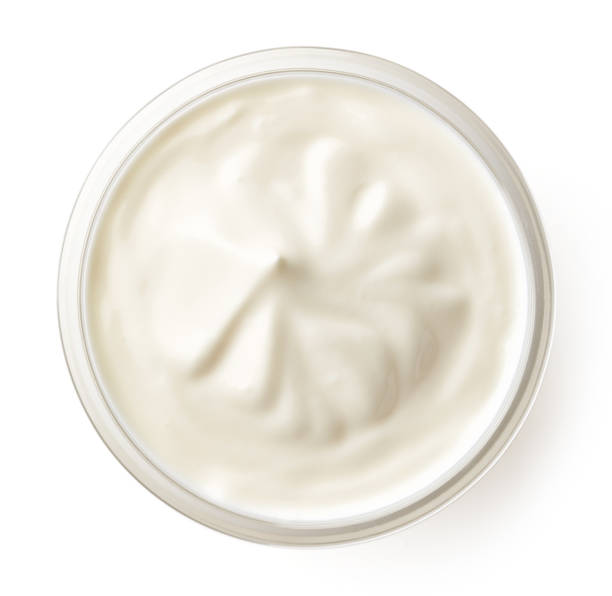 istock Bowl of cream isolated on white, from above 831411140