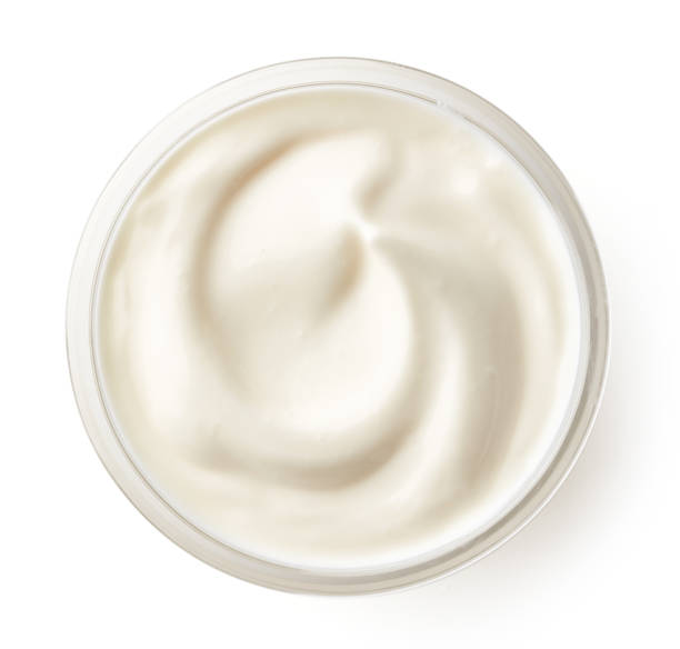 istock Bowl of cream isolated on white, from above 831411148