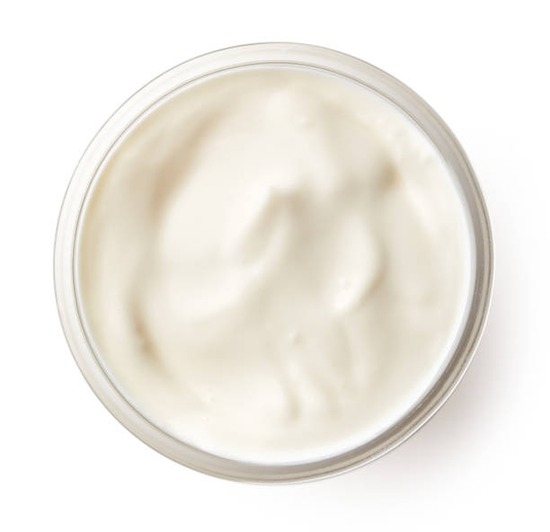 istock Bowl of cream isolated on white, from above 831411184