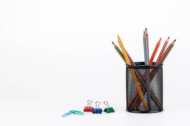istock Colored pencils in a case on white background 831411602