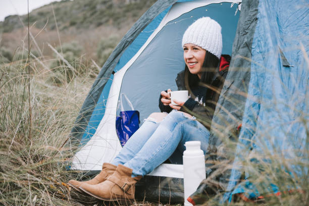 istock Young woman in a tent 831412104