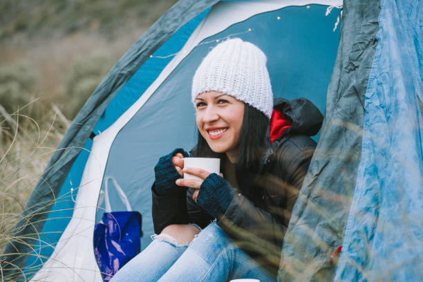 istock Young woman in a tent 831412244