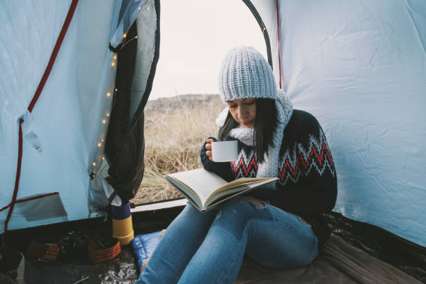 istock Young woman in a tent 831414766