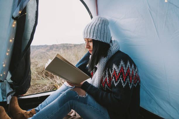 istock Young woman in a tent 831414914