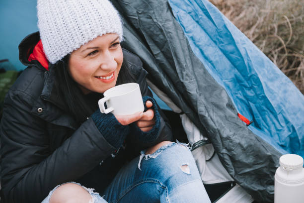 istock Young woman in a tent 831415624