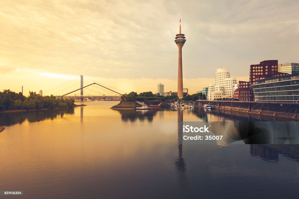 duesseldorf cityscape at sunset dusseldorf cityscape with view on media harbor at sunset, Germany. Düsseldorf Stock Photo
