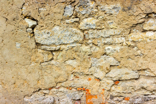 istock old concrete plaster brick wall texture urban background 831419946