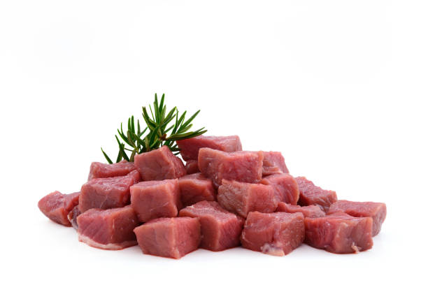 istock Raw meat, beef steak sliced in cubes isolated on white background 831422434