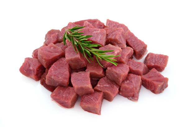 istock Raw meat, beef steak sliced in cubes isolated on white background 831422470