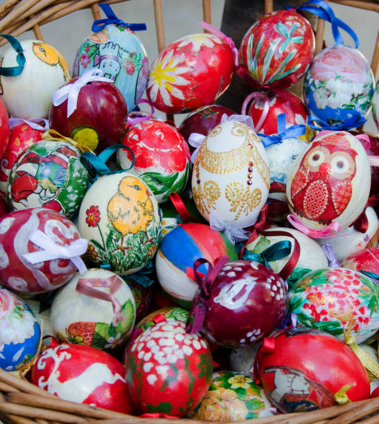 istock Top view on heap of eastern decorative colored eggs for Easter holiday hunt. 831422954