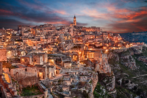 Matera, Basilicata, Italy: landscape of the old town Matera, Basilicata, Italy: landscape at dawn of the old town (sassi di Matera), European Capital of Culture 2019 ravine photos stock pictures, royalty-free photos & images